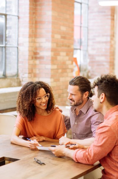 Couple talking with realtor